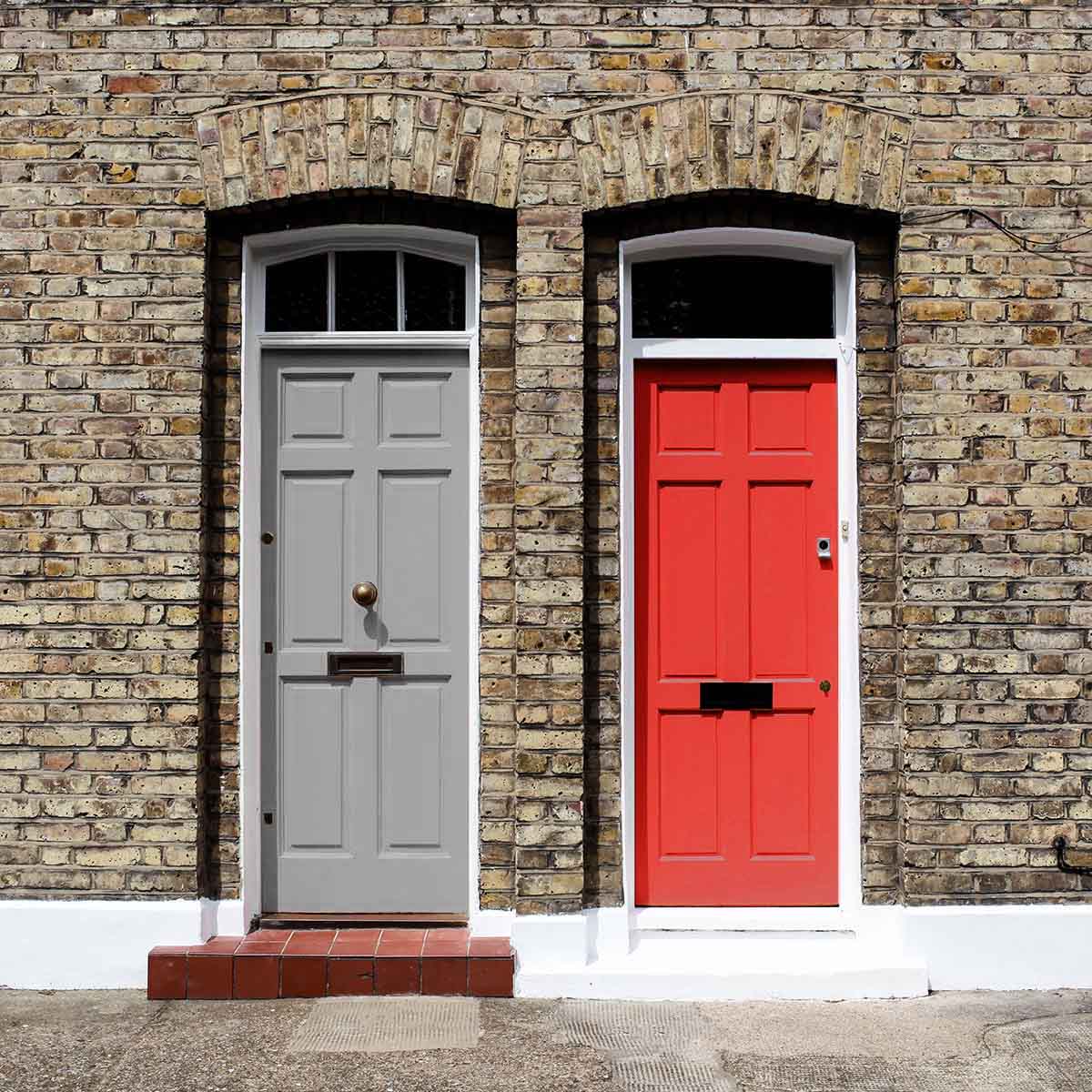 Party wall between two doors